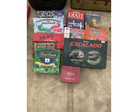 A LARGE ASSORTMENT OF BOARD GAMES TO INCLUDE FIRST QUEST, ESCALADO, DIXIT, ETC