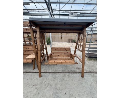 AN AS NEW EX DISPLAY CHARLES TAYLOR GARDEN FURNITURE SET TO INCLUDE ONE ARBOUR AND DOUBLE SWING SEAT WITH COVER