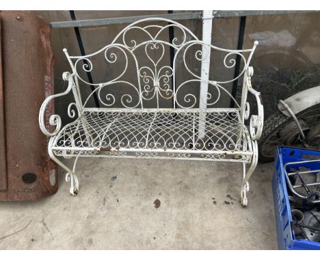 A DECORATIVE WHITE METAL FOLDING TWO SEATER GARDEN BENCH