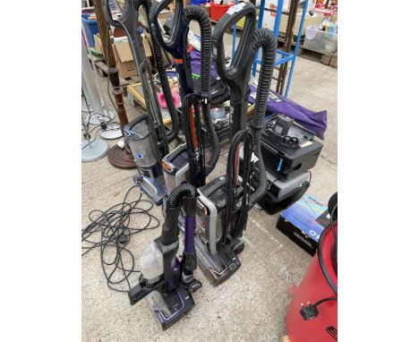 A SHARK LIFT AWAY VACUUM CLEANER AND A SHARK STICK VACUUM