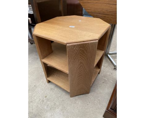 A MID 20TH CENTURY LIGHT OAK TWO TIER OCCASIONAL TABLE WITH CANTED CORNERS