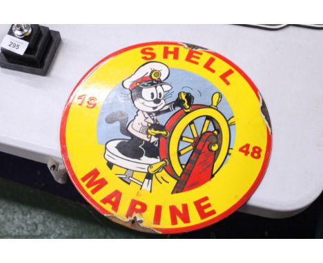 AN ENAMEL SIGN '1948 SHELL MARINE', DIAMETER 30CM