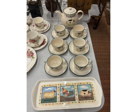 A CLOVERLEAF 'FARM ANIMALS' TEA SET INCLUDING TEA POT, SIX CUPS AND SAUCERS AND A SANDWICH TRAY