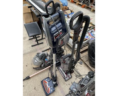 A SHARK LIFT AWAY VACUUM CLEANER AND A SHARK STICK VACUUM