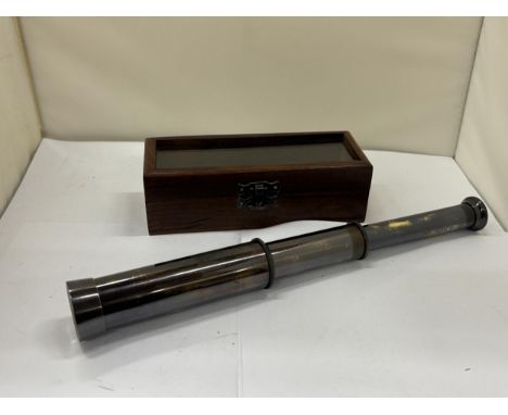 A BOXED BRASS TELESCOPE