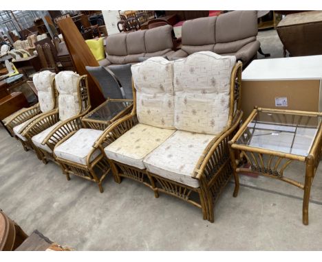 A WICKER AND BAMBOO CONSERVATORY FURNITURE SET COMPRISING SETTEE, TWO CHAIRS, TWO STOOL AND TWO LAMP TABLES