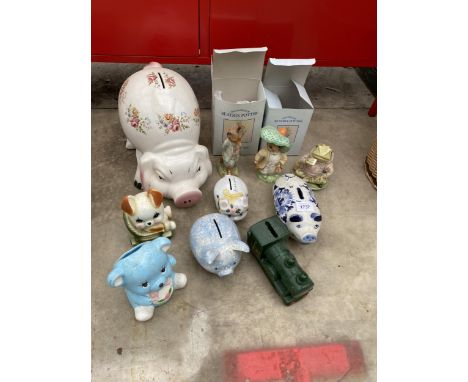 A COLLECTION OF CERAMIC MONEY BOXES AND FIGURES TO INCLUDE TWO BOXED ROYAL ALBERT BEATRIX POTTER FIGURES
