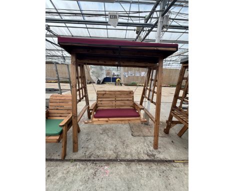 AN AS NEW EX DISPLAY CHARLES TAYLOR GARDEN FURNITURE SET. TO INCLUDE ONE ARBOUR WITH COVER AND ONE (A/F) DOUBLE SWING SEAT WI