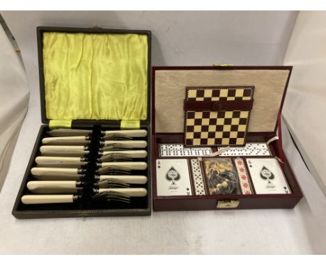 A VINTAGE SIX PIECE FISH KNIFE AND FORK SET TOGETHER WITH A TABLETOP GAMES COMPENDIUM CASE