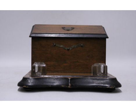 A VINTAGE OAK DESK STATIONERY BOX WITH GLASS INKWELLS