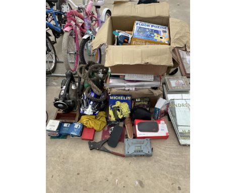 AN ASSORTMENT OF ITEMS TO INCLUDE GAMES, A BIKE HELMET AND A SEWING MACHINE ETC