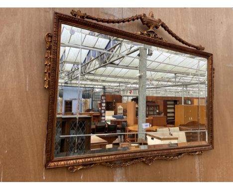 A VINTAGE GILT FRAMED BEVEL EDGE WALL MIRROR, 37" X 30"