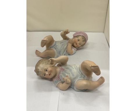 A PAIR OF GEBRUDER BISQUE BABY FIGURINES