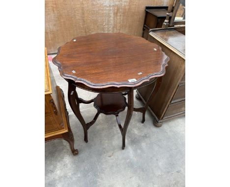 A MAHOGANY CENTRE TABLE WITH LOWER SHELF