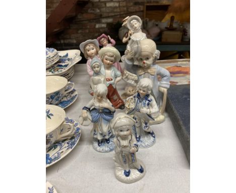 A COLLECTION OF CERAMIC AND PORCELAIN FIGURES