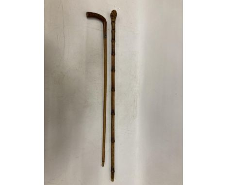A BAMBOO 19TH CENTURY SWORD STICK AND A VINTAGE WALKING CANE