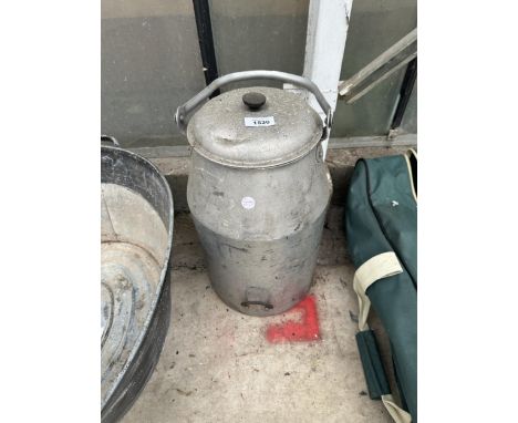 A SMALL VINTAGE GALVANISED MILK CHURN WITH LID