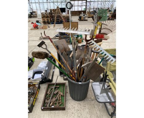 A LARGE ASSORTMENT OF GARDEN HAND TOOLS INCLUDE A STAINLESS STEEL RAKE AND EDGE CUTTER, SHOVELS, ETC