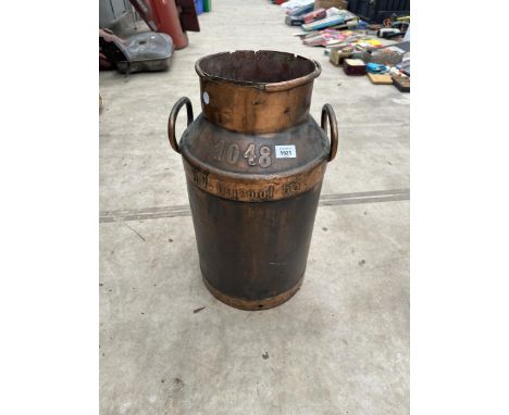 A COPPER EFFECT STEEL MILK CHURN BEARING THE NAME N V LIJEMPT 53