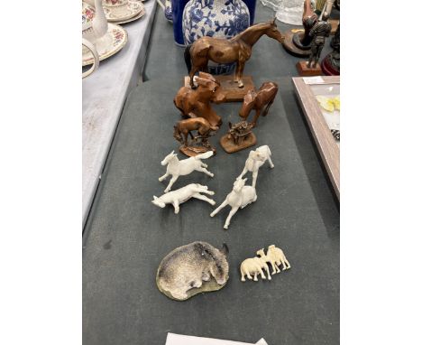 TWELVE VARIOUS FIGURES OF HORSES, DONKEYS AND CAMELS MADE OF VARIOUS MATERIALS, WOOD, METAL AND CERAMIC ETC