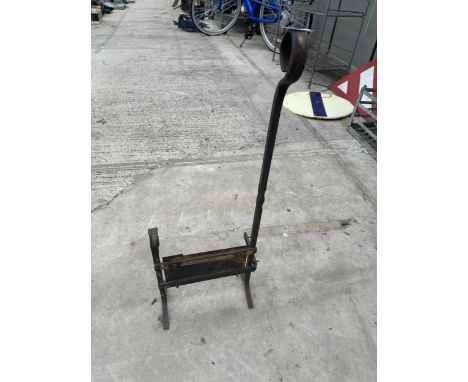 A SMALL VINTAGE METAL BOOT SCRAPER