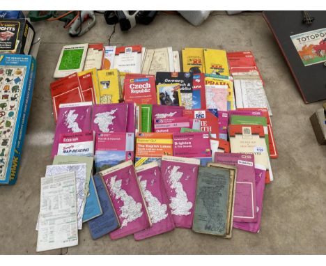 A LARGE ASSORTMENT OF ORDNANCE SURVEY MAPS AND TRAVEL GUIDES TO INCLUDE PENRITH AND KESWICK, ABERYSTWYTH, ETC
