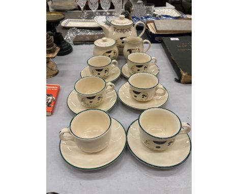 A CLOVERLEAF EARTHENWARE TEA SET DEPICTING FARM ANIMALS TO INCLUDE TEAPOT, MILK JUG, SUGAR BOWL AND SIX TEACUPS WITH SAUCERS