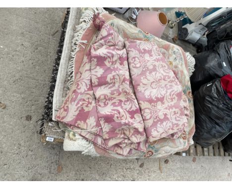 AN ASSORTMENT OF RUGS AND CURTAINS
