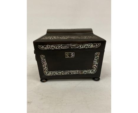 AN EBONY AND MOTHER OF PEARL TEA CADDY