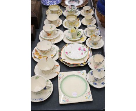 A LARGE QUANTITY OF TEACUPS AND SAUCERS TO INCLUDE BURLEIGH IMPERIAL SHAPE 1930'S ART DECO CORNFLOWER PATTERN, CLARICE CLIFF 