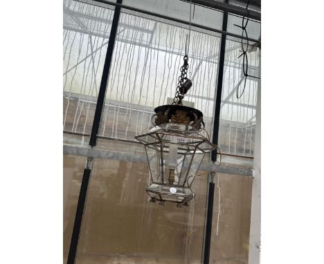 A DECORATIVE BRASS EFFECT AND GLASS CEILING LIGHT FITTING