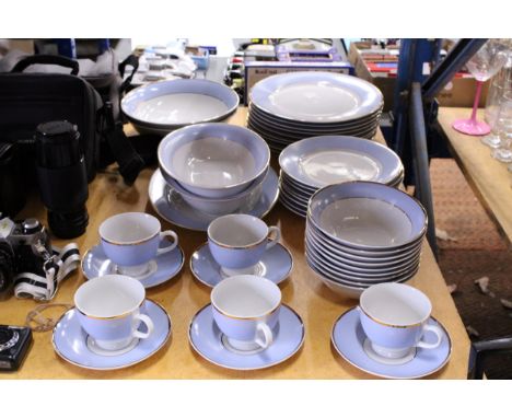 A DOULTON PART DINNER SERVICE (39 PIECES) IN PALE BLUE WITH GILT HIGHLIGHTS TO INCLUDE SERVING PLATES AND BOWLS, DINNER AND S