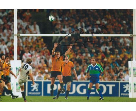 Rugby Union Jonny Wilkinson signed 12x8 inch colour photo pictured scoring the winning drop goal for England during the 2003 