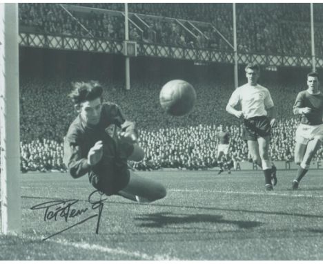 Football Pat Jennings signed 10x8 inch black and white vintage photo pictured in action for Tottenham Hotspur. Good condition