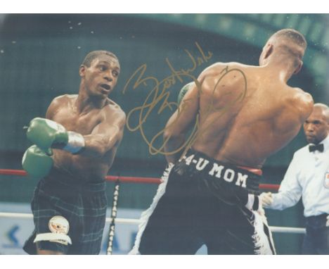 Boxing Herol Bomber Graham signed 16x12 inch colour photo. Good condition. All autographs are genuine hand signed and come wi