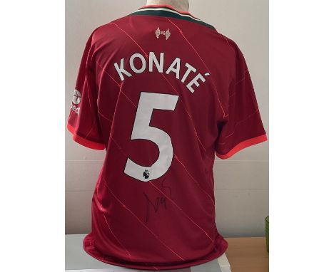 Football Ibrahima Konate signed Liverpool F.C replica home shirt size large. Good condition. All autographs are genuine hand 