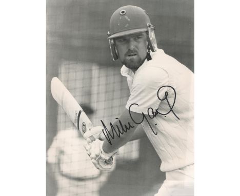 Cricket Mike Gatting signed 10x7 inch vintage black and white photo. Good condition. All autographs are genuine hand signed a