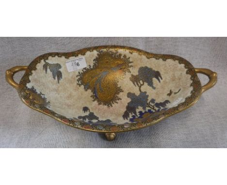 A CARLTONWARE BOWL decorated with exotic birds (examine)