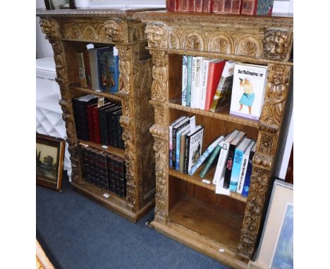 A PAIR OF LIGHT OAK OPEN FRONT BOOKCASES, with Jacobean style carving, each 47" high x 26" wide