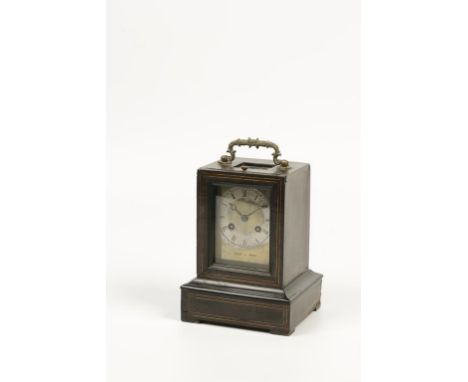 A 19TH CENTURY FRENCH MANTEL CLOCK, with a brass dial and silvered chapter ring, signed 'Leroi a Paris' with a two train move
