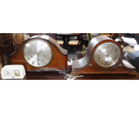 A 1920'S OAK CASED MANTEL CLOCK, a 1950's walnut mantel clock and a cream Bakelite cased bedside clock (3) (mantel clock keys