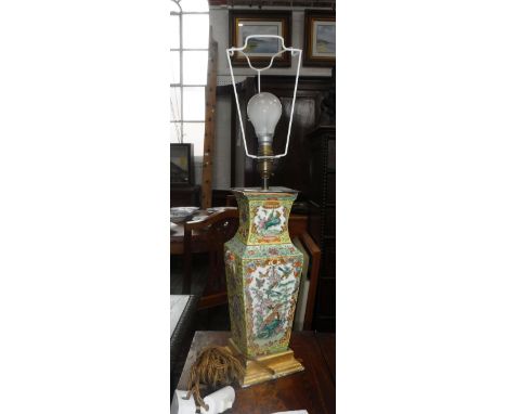 AN ORIENTAL FAMILLE JAUNE VASE, of square form, converted to a table lamp, with a giltwood base (13" high including gilt base