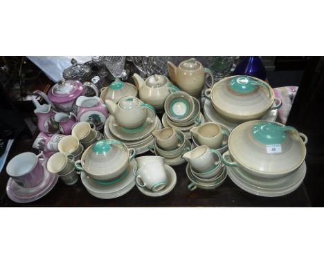 SUSIE COOPER: A 1930S ART DECO DINNER AND TEA SERVICE, decorated with green and brown hand-painted bands together with a coll
