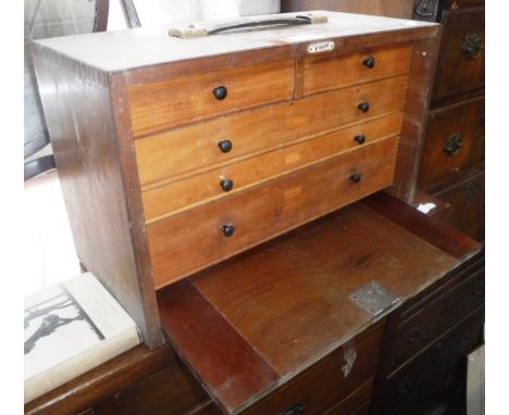 AN 'IMIR' WOODEN TOOL BOX, fitted five drawers, containing a few tools and instruments 