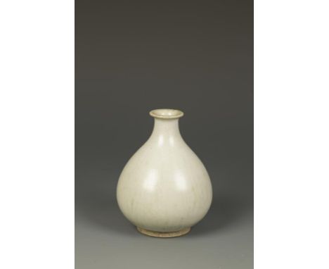 A JAPANESE PEAR-SHAPED VASE with a smooth 'ostrich-egg' glaze, signed 'Seiryu Gama'