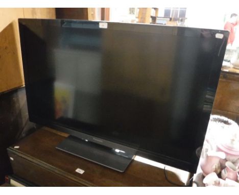 A PANASONIC FLAT SCREEN TELEVISION (TX-L42E30B 42 SERIES LED) with paper work, no user manual (Controller and paperwork in of
