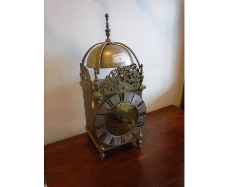 A REPRODUCTION BRASS CASE LANTERN CLOCK 16" high  (including finial)