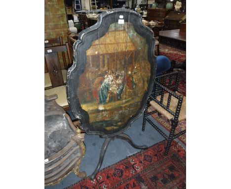 AN 18TH CENTURY JAPANNED PINE AND OAK TRIPOD TABLE, the shaped top painted with The Nativity, 27.5" x 37"