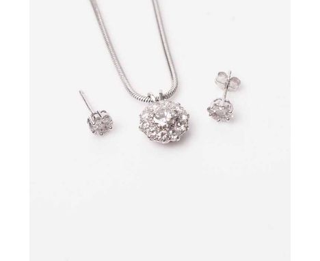 DIAMOND CLUSTER PENDANT AND EARRINGS SET
the pendant of circular form, set centrally with a brilliant cut diamond of approxim