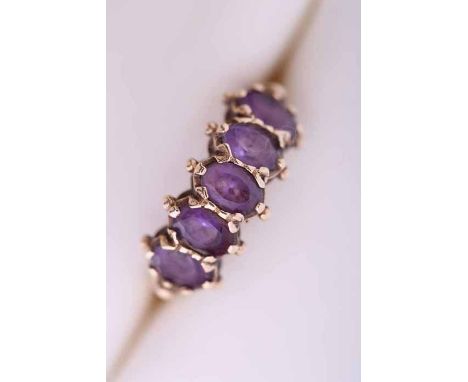 AMETHYST FIVE STONE RING
set with five oval amethysts, hallmarked nine carat gold, size P